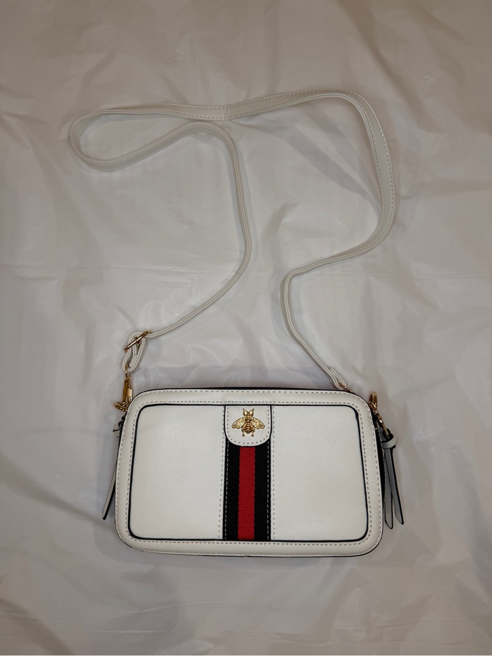 White Crossbody Bag with Red and Black Stripe and Gold Bee Accent